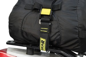 Photo showing pair of Rigg Straps securing cover in compression bag to rack